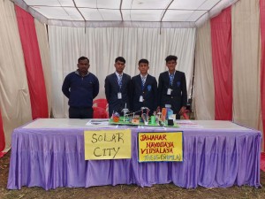 A school showcasing their model on solar energy