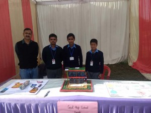 A school showcasing their model on solar energy